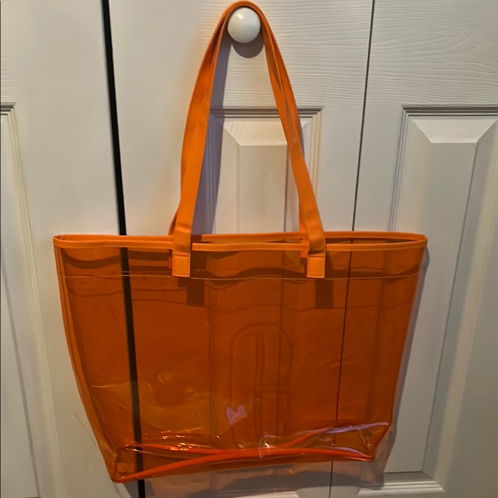 Clinique Vibrant Orange Tote Bag with Sturdy Handles and Transparent Material
